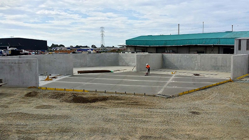 Formfour placing concrete cuts in the Higgins Asphalt Plant Slab