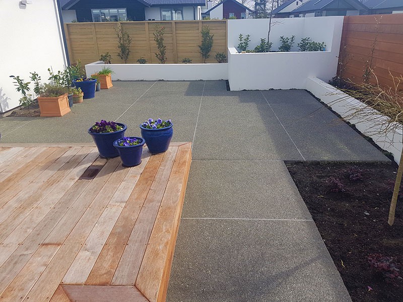 Formfour Exposed aggregate patio and concrete block wall